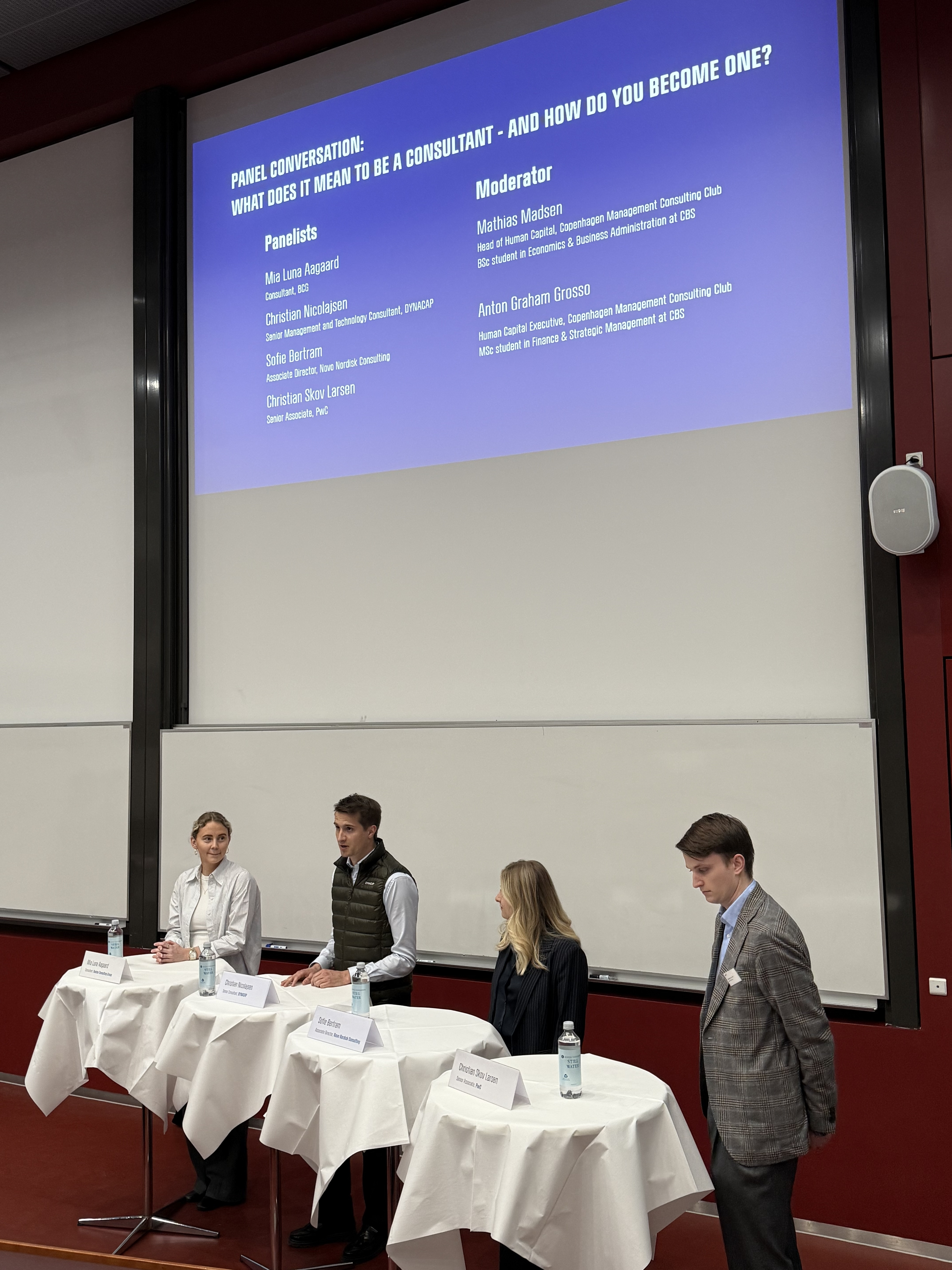 Four panelists at a CBS Consulting panel debate.